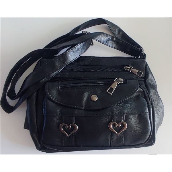 Brand new black PU leather small shoulder bag with heart design.
