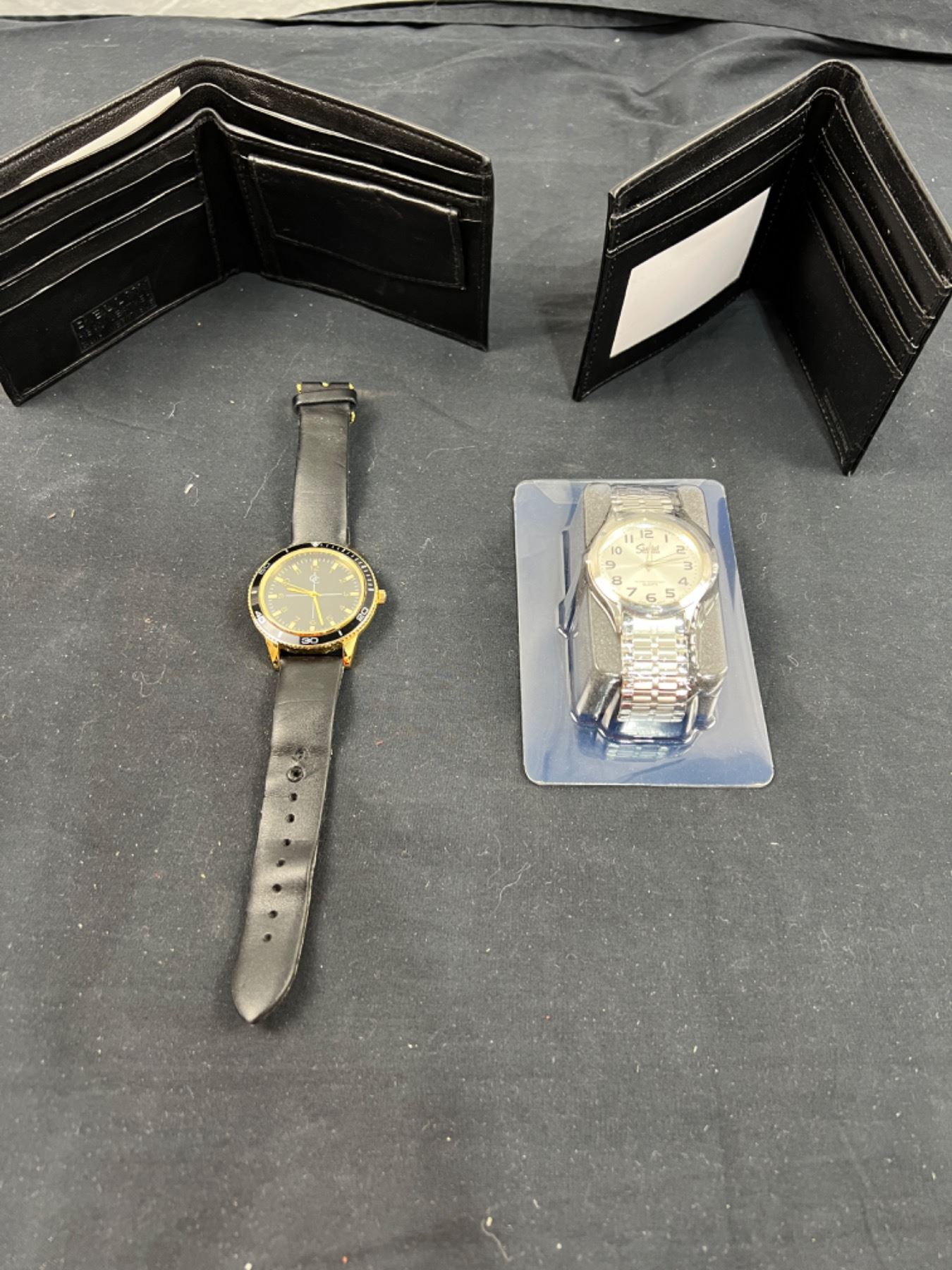 2 Leather Wallets & 2 Men's Watches - Sunrise Estate Services Ltd