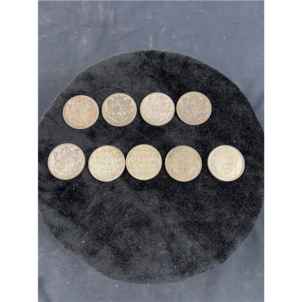 Nine 0.50 Cent Canadian Coins