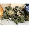 Image 10 : Large group of assorted Millitary items - includes Millitary boots / tarps / clothing / army berets 