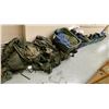 Image 1 : Large group of assorted Millitary items - includes Millitary boots / tarps / clothing / army berets 
