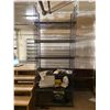 Image 2 : Room full of 6-tier metal shelving display units (approx 36in x 27in x 92in H) approx 8 shelving uni
