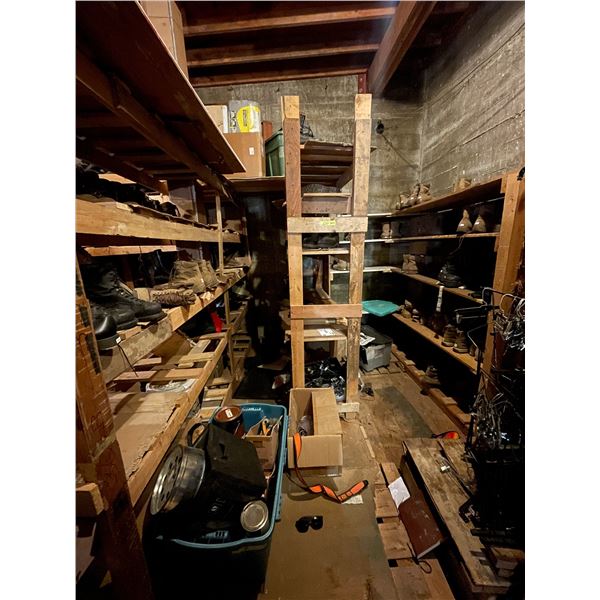 Shelving units full of assorted millitary boots & misc items (shelving units included - approx 7ft l