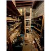 Image 1 : Shelving units full of assorted millitary boots & misc items (shelving units included - approx 7ft l