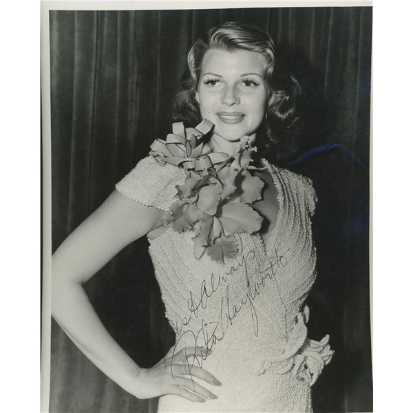 Rita Hayworth signed photo. GFA Authenticated