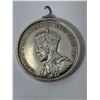 Image 2 : Canadian 1935 Silver Dollar In Bezel
