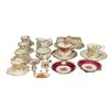 Image 1 : Large Assortment Of Miniature Porcelain Dishware, Tea Cup Saucer, Butter Dish, Pitcher, Etc..