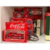 Image 2 : Large Assortment Of Coca Cola Collectibles, Mugs, Toothpick Dispenser, Cars, Christmas Village Groce