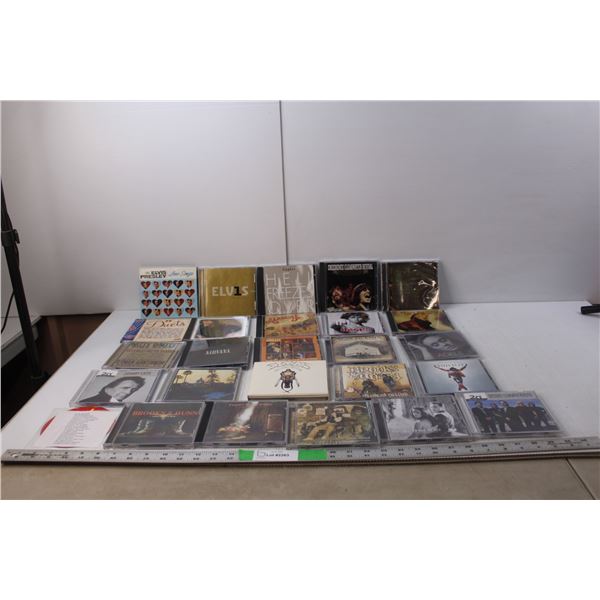 (26) CDs- CCR, Nirvana, The Doors, Brooks & Dunn, Adele, Elvis Presley, Misc.