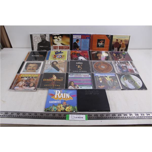 (22) Assorted CD's (Roy Orbison, George Strait, ABBA, AC/DC)