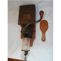 Golden Rule Blend wall hung coffee grinder.