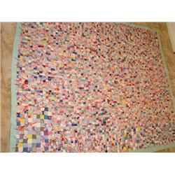 Postage stamp quilt,hand stitched, hand tied.