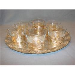 Set of 6 silver/glass punch cups on tray.