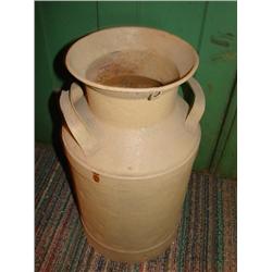 Old metal milk can