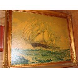 Ship print in ornate gold frame