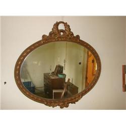 Ornate gold framed mirror