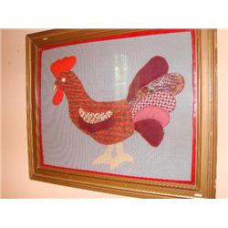 Rooster handwork, framed behind glass