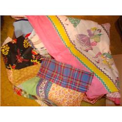 Box of quilting squares & fabric.