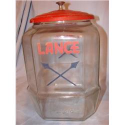 Lance jar with red metal lid