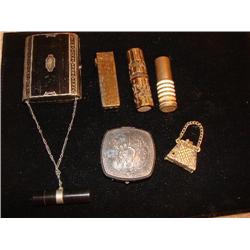 Vintage compacts, lipstick cases, perfumes
