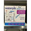 Image 1 : Waterpik Waterflosser, travel bag, charging cable, 5 Accessory tips and 1 Pearl waterflosser