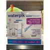 Image 1 : Waterpik Water Flosser Cordless Pearl Ultra Plus, flosser, 5 accessory tips, USB charging cable and 