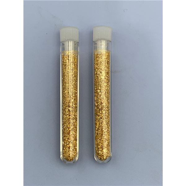 Lot of 2 large vial of golden flaking material