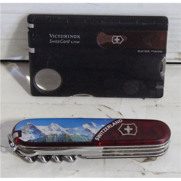 BAG WITH 2 SWISS ARMY KNIVES