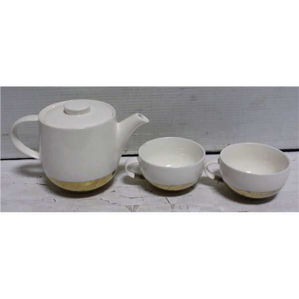 GOLD AND WHITE CERAMIC TEA SET