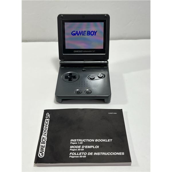 Black Nintendo Game Boy Advance SP with booklet