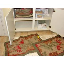 Throw Rugs in Cabinet/Floor