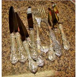 Reed & Barton Sterling (8 knives, 3 Forks)