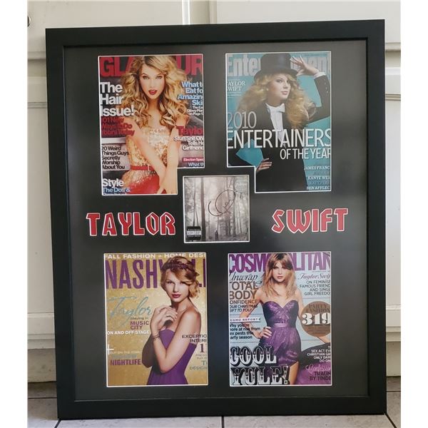 Taylor Swift signed CD cover in a 24” x 28” framed display.  Global Authentics COA