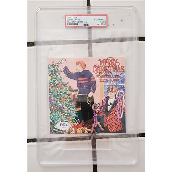 Elton John Autographed CD Cover.   PSA COA.
