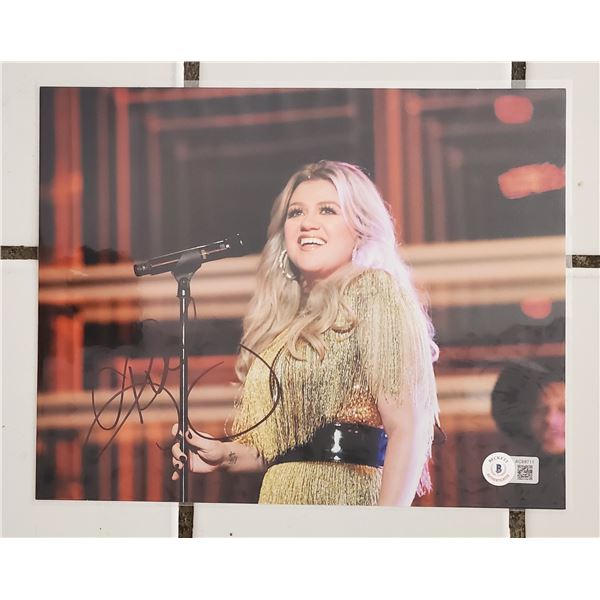 Kelly Clarkson  Autographed 8” x 10” Photograph.  Beckett COA.