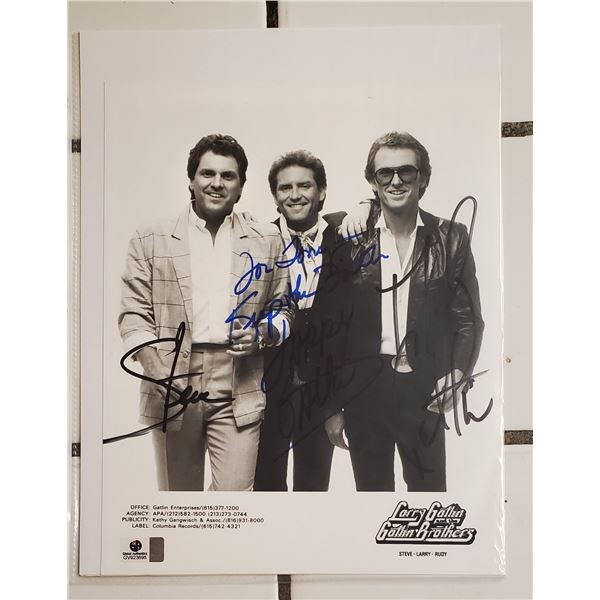 Larry Gatlin and the Gatlin Brothers Autographed 8” x 10” Photograph. Global Authe