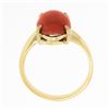 Image 7 : Vintage 14K Gold Elongated Oval Cabochon Pinkish-Orange Coral Solitaire Ring
