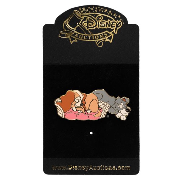 A Disney Auctions Lady and Tramp Napping Pin.