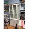 Image 2 : Two piece display cabinet base measures 40" x 17" the cabinet is 75 inches tall