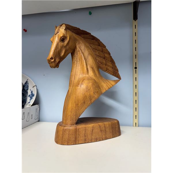 Carved horse bust