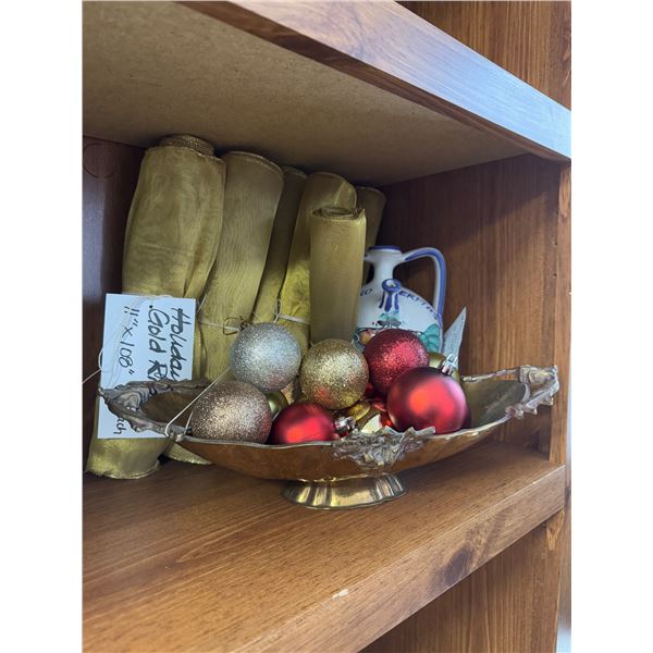 Gold ribbon, Christmas balls, wine, decanter, and decor bowl
