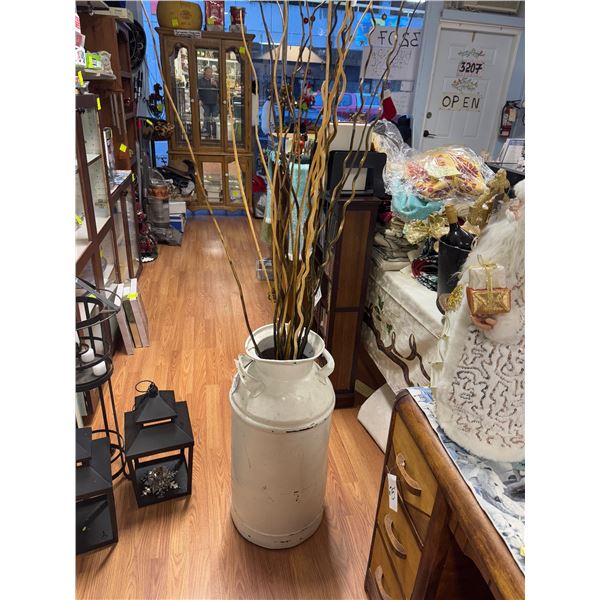 Dairy land can with stick decor