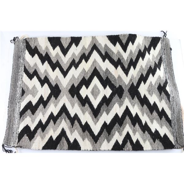Three Navajo Rugs.