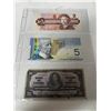 Image 3 : Currency collector binder - many Canadian bills and coins, including some foreign bills and coins