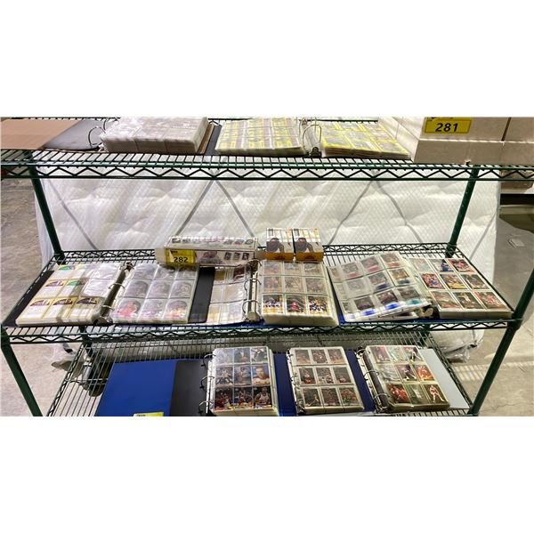 SHELF OF ASSORTED BASKETBALL & BASEBALL CARDS