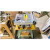 Image 2 : DEWALT DW744 10" JOB SITE TABLE SAW ON GENERAL INTERNATIONAL PORTABLE STAND