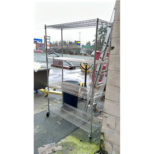 METAL ROLLING RACK (DAMAGED WHEEL)