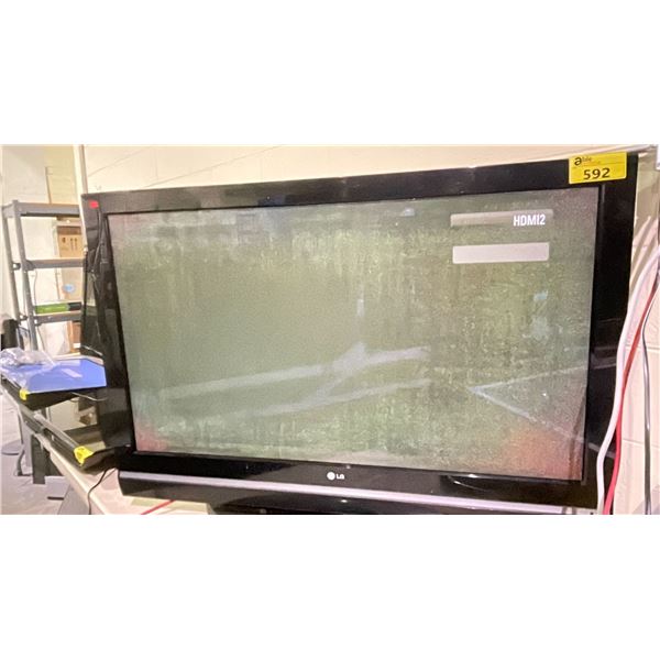 LG 50" TV WITH POWER CORD & STAND (PICTURE ISSUE, NO REMOTE)