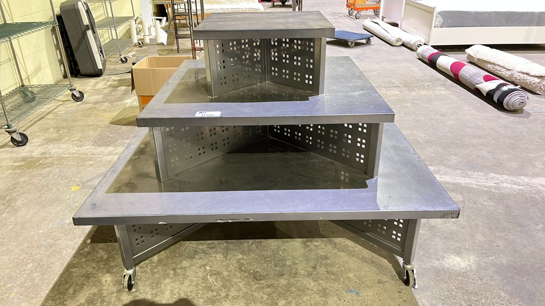 3 TIER METAL PYRAMID STYLE ROLLING RACK - Able Auctions