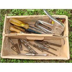 Canada Dry box, filled with hand tools.